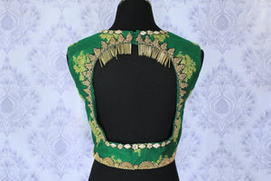 Buy green embroidered sleeveless sari blouse online in USA. Find matching designer saree blouses for your beautiful Indian sarees in USA at Pure Elegance exclusive clothing store or shop online.-back
