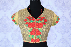 Up your fashion appeal in this aesthetically pleasing beige floral embroidered designer blouse. The melange of red and green floral hues with a keyhole at back creates quite a stunning look. Shop such beautiful blouses online or visit Pure Elegance store in USA.-front