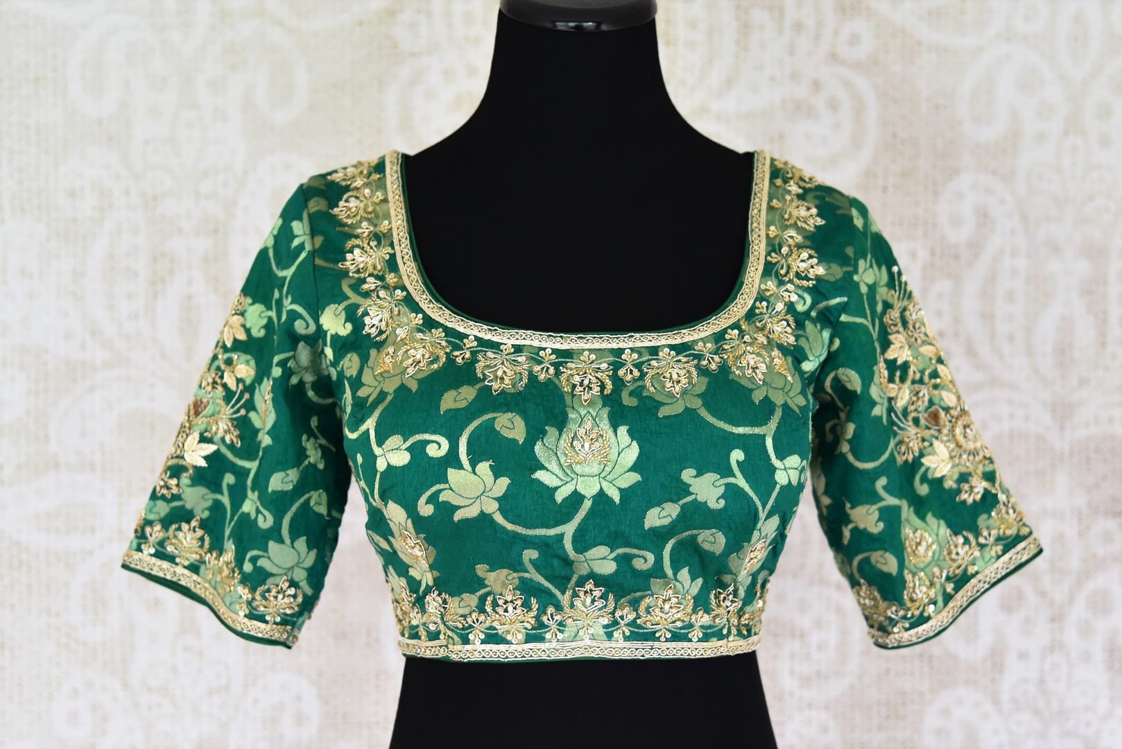 Shop green Banarasi embroidered readymade saree blouse online in USA . Pure Elegance Indian clothing store brings a stylish range of designer sari blouses in USA. You can also shop online and enjoy speedy delivery at your doorsteps. Shop now.-front