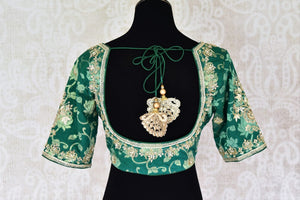 Shop green Banarasi embroidered readymade saree blouse online in USA . Pure Elegance Indian clothing store brings a stylish range of designer sari blouses in USA. You can also shop online and enjoy speedy delivery at your doorsteps. Shop now.-back