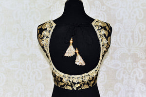 Buy black Banarasi embroidered sleeveless saree blouse online in USA . Pure Elegance Indian clothing store brings a stylish range of designer saree blouses in USA. You can also shop online and enjoy speedy delivery at your doorsteps. Shop now.-back