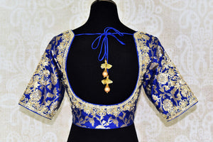 Buy beautiful blue Banarasi embroidered readymade saree blouse online in USA. Match your saree with exquisite designer saree blouses from Pure Elegance clothing store in USA. Shop now at our store or visit online.-back