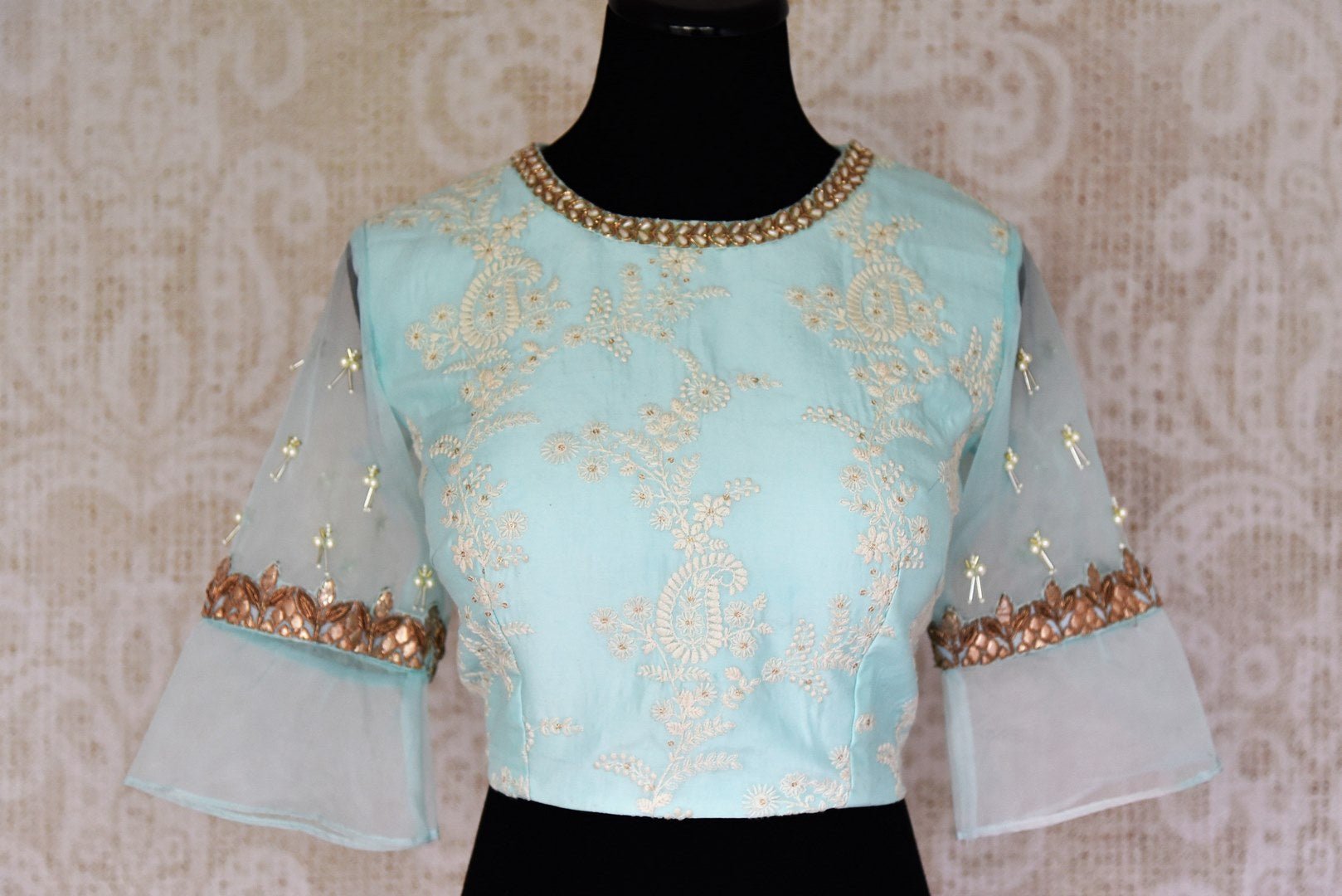 Buy pastel blue silk embroidered saree blouse online in USA. Match your saree with exquisite designer sari blouses from Pure Elegance clothing store in USA. Shop now at our store or visit online.-front