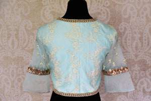 Buy pastel blue silk embroidered saree blouse online in USA. Match your saree with exquisite designer sari blouses from Pure Elegance clothing store in USA. Shop now at our store or visit online.-back
