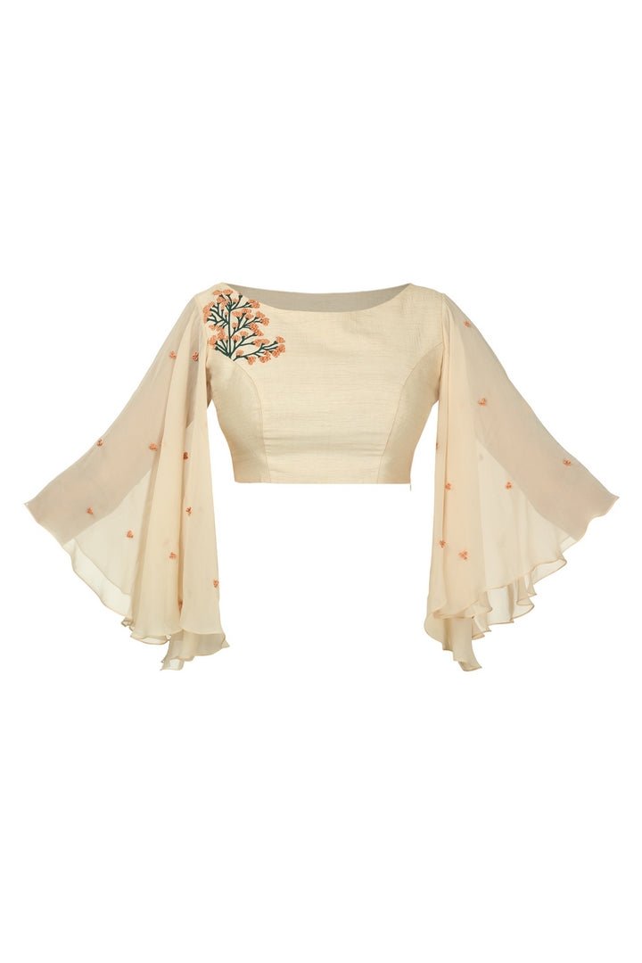 Buy beige raw silk angle sleeved blouse online in USA with shoulder embroidery. Match your designer sarees with stylish Indian readymade saree blouses available at Pure Elegance clothing store in USA or shop online.-full view