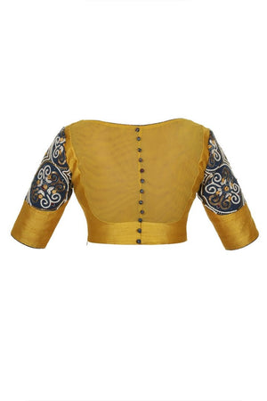 Buy mustard yellow raw silk designer saree blouse online in USA with ajrak applique. Match your designer sarees with stylish Indian readymade saree blouses available at Pure Elegance clothing store in USA or shop online.-back