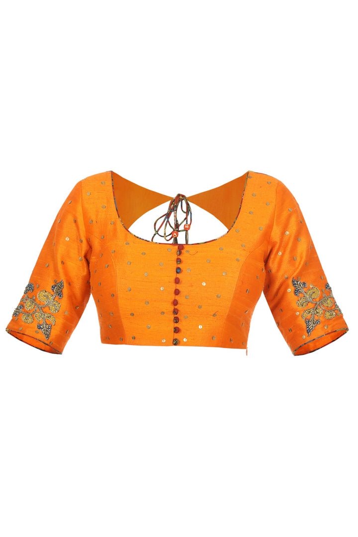 Shop designer orange raw silk Kalamkari sari blouse online in USA. Take your saree style a level up with beautiful readymade sari blouses from Pure Elegance Indian fashion store in USA. You can also shop Indian clothing online from our online shopping website.-front
