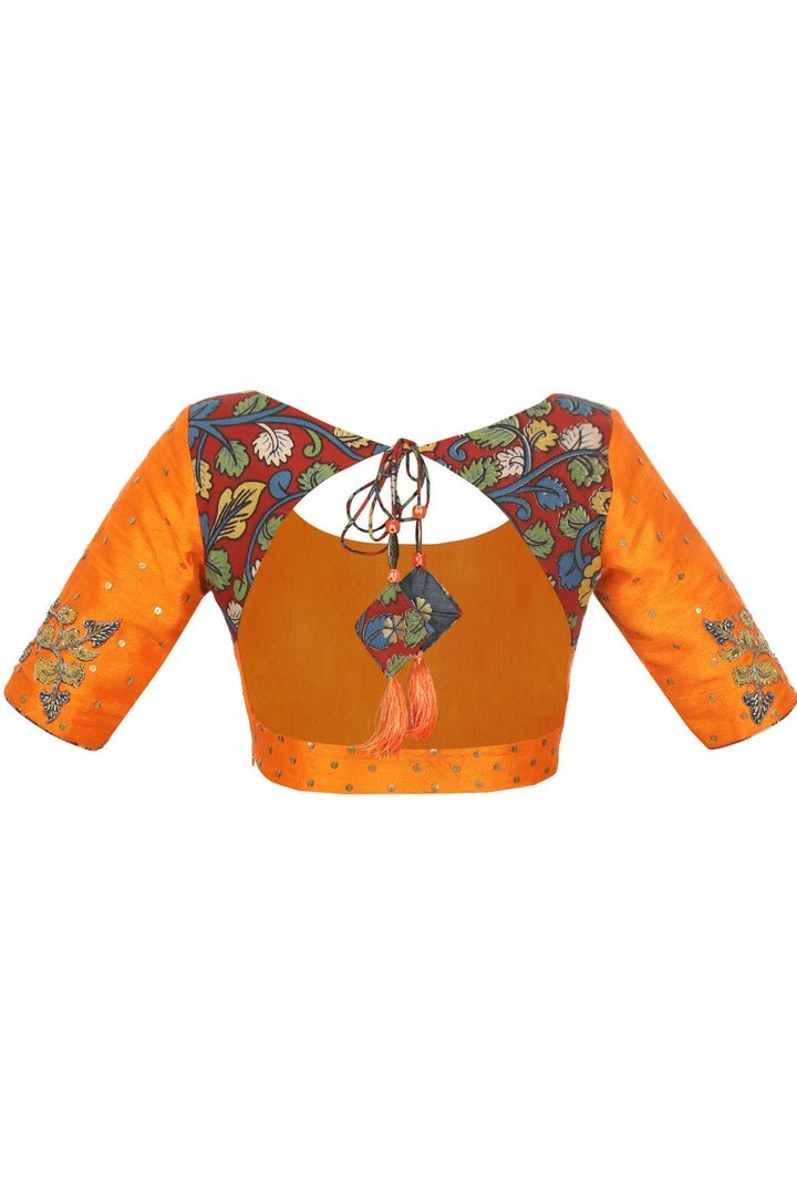 Shop designer orange raw silk Kalamkari sari blouse online in USA. Take your saree style a level up with beautiful readymade sari blouses from Pure Elegance Indian fashion store in USA. You can also shop Indian clothing online from our online shopping website.-back