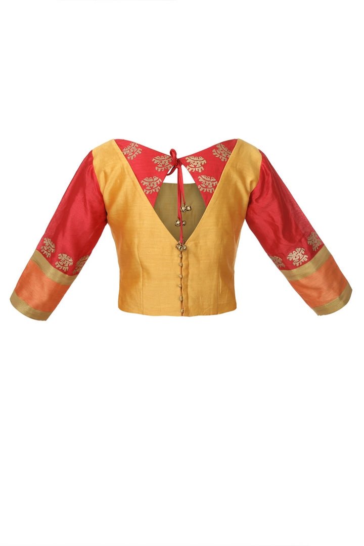 Buy bright yellow and red kora chanderi sari blouse online in USA with ghungroo block print. For a chic twist to your sarees choose from a range of exquisite designer sari blouses from Pure Elegance Indian clothing store in USA or shop online.-back