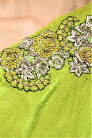 Buy lime green embroidered blouse with white floral skirt online in USA. Make your ethnic look absolutely captivating in Indian designer dresses, party dresses from Pure Elegance exclusive Indian clothing store in USA or shop online.-details