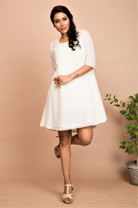 Shop ivory A-line short tunic dress online in USA at Pure Elegance. Bring a refreshing touch to your summer look with alluring Indian dresses, Indowestern dresses available at our exclusive fashion store in USA or shop at our online store.-full view