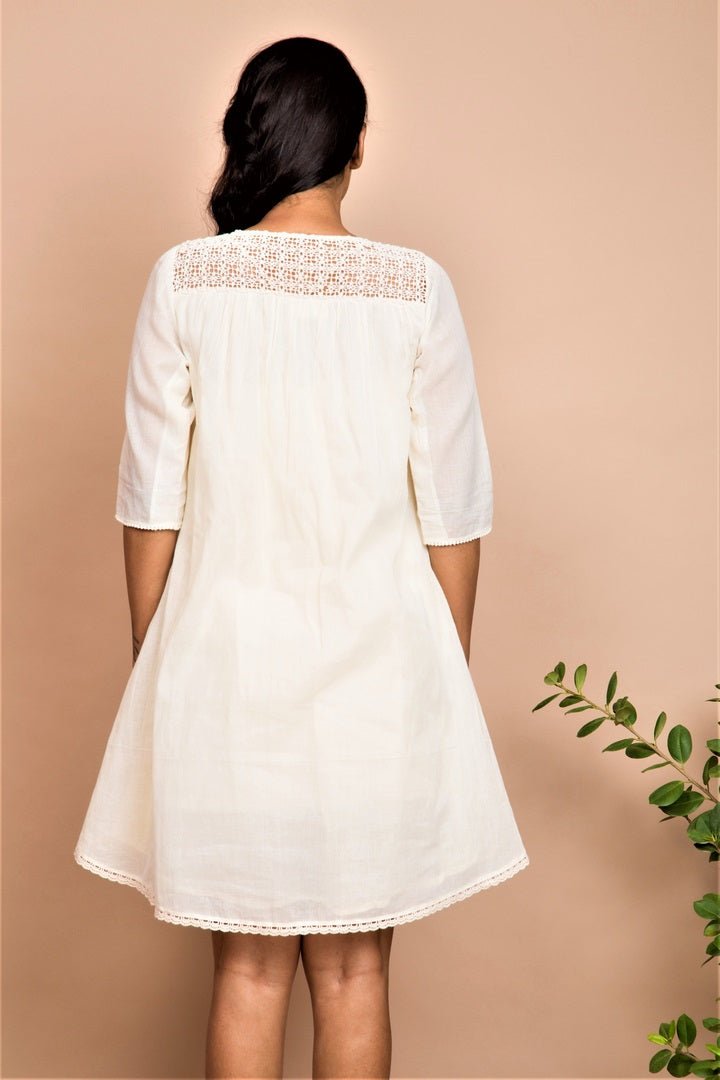 Shop ivory A-line short tunic dress online in USA at Pure Elegance. Bring a refreshing touch to your summer look with alluring Indian dresses, Indowestern dresses available at our exclusive fashion store in USA or shop at our online store.-back