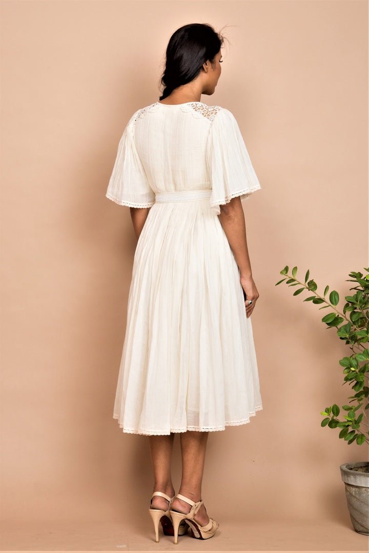 Buy ivory pleated midi dress online in USA at Pure Elegance. Bring a refreshing touch to your summer look with alluring Indian dresses, Indowestern dresses available at our exclusive fashion store in USA or shop at our online store.-back