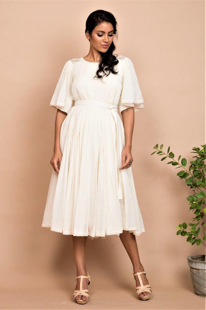 Buy ivory pleated midi dress online in USA at Pure Elegance. Bring a refreshing touch to your summer look with alluring Indian dresses, Indowestern dresses available at our exclusive fashion store in USA or shop at our online store.-front