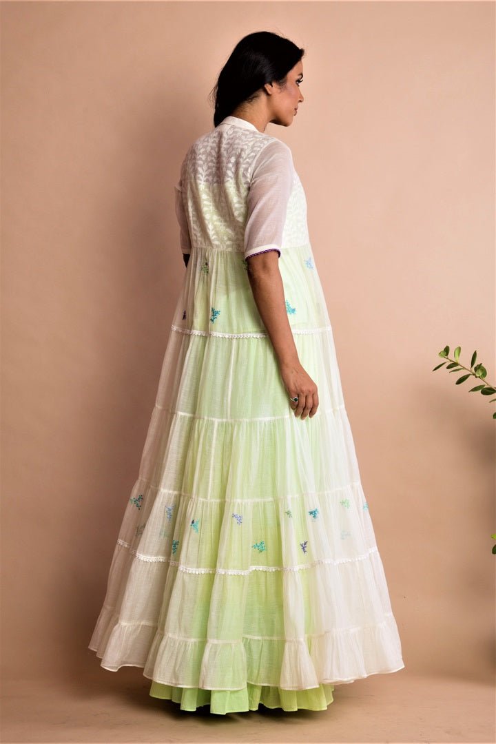 Shop ivory full flare frilled long jacket with hand embroidery online in USA at Pure Elegance. Bring a refreshing touch to your look with alluring Indian dresses, Indowestern dresses, party dresses available at our exclusive fashion store in USA or shop at our online store.-side