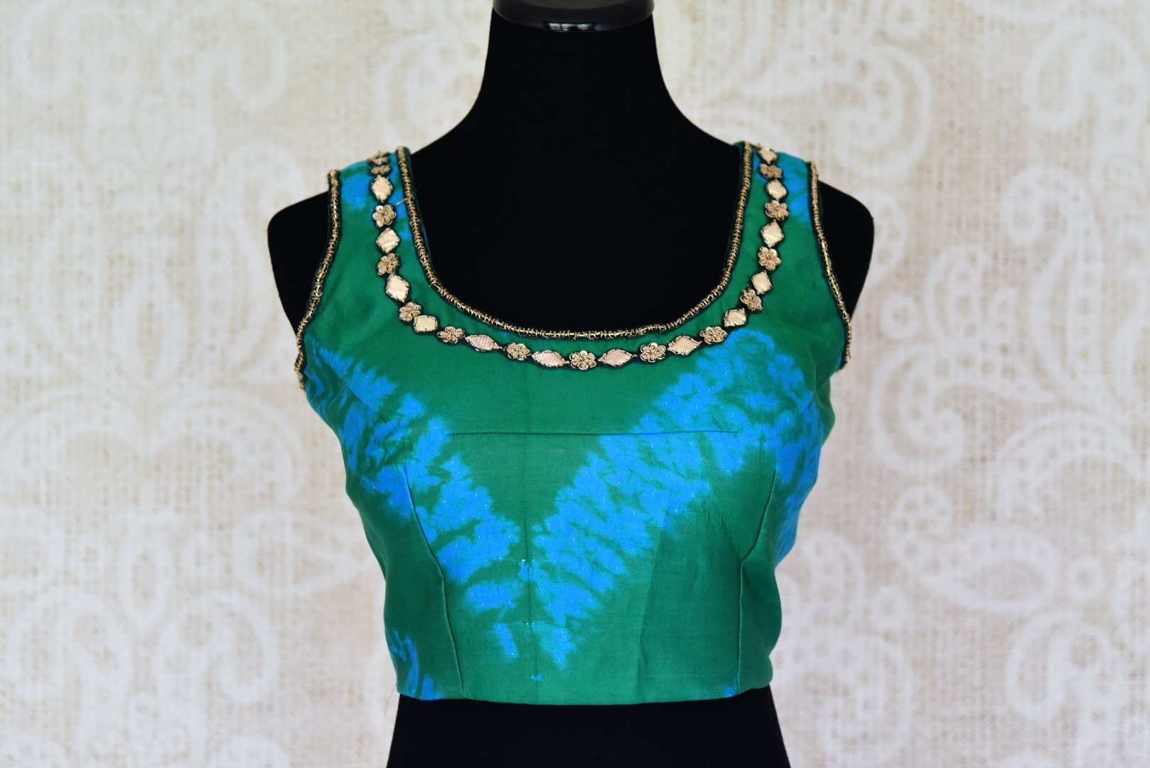 Buy green and blue embroidered silk sleeveless saree blouse online in USA. Match your designer sarees with a range of stylish Indian sari blouses from Pure Elegance clothing store in USA. Shop now.-front