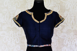 Buy beautiful navy blue embroidered silk saree blouse online in USA. Match your designer sarees with a range of stylish Indian readymade saree blouses from Pure Elegance clothing store in USA. Shop now.-front