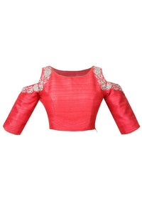 Buy rouge pink raw silk cold shoulder saree blouse online in USA. Find the right matching saree blouses for your designer sarees at Pure Elegance online store. We have an alluring collection of designer readymade sari blouses at our exclusive fashion store in USA. Shop now.-front
