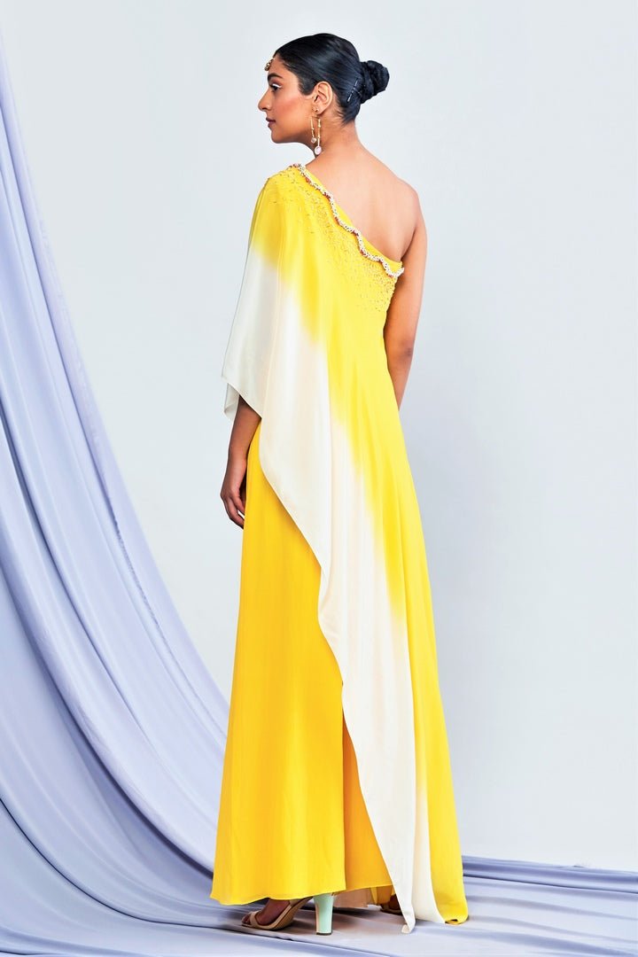 Buy ombre dyed off shoulder jumpsuit online in USA with hand embroidery. Shop exclusive Indian designer saris, party sarees, wedding sarees in USA at Pure Elegance clothing store. Explore a range of traditional Indian women clothing also available at our online store. Shop now.-back