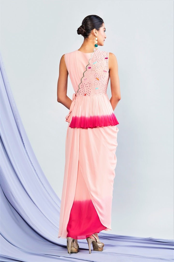 Buy elegant ombre pink embroidered peplum kurta with drape skirt online in USA. Shop exclusive Indian designer saris, party sarees, wedding dresses in USA at Pure Elegance clothing store. Explore a range of traditional Indian women clothing also available at our online store. Shop now.-back