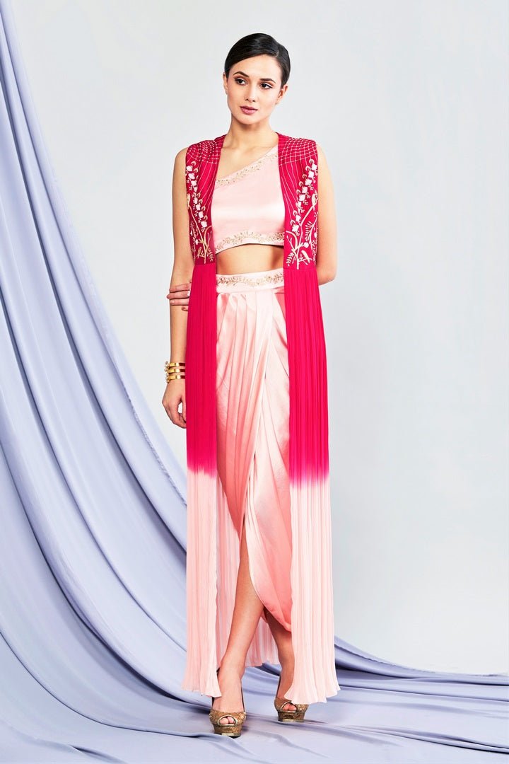 Shop blush pink embroidered top with drape skirt and cape online in USA. Shop exclusive Indian designer saris, party dresses, wedding dresses in USA at Pure Elegance clothing store. Explore a range of traditional Indian women clothing also available at our online store. Shop now.-full view