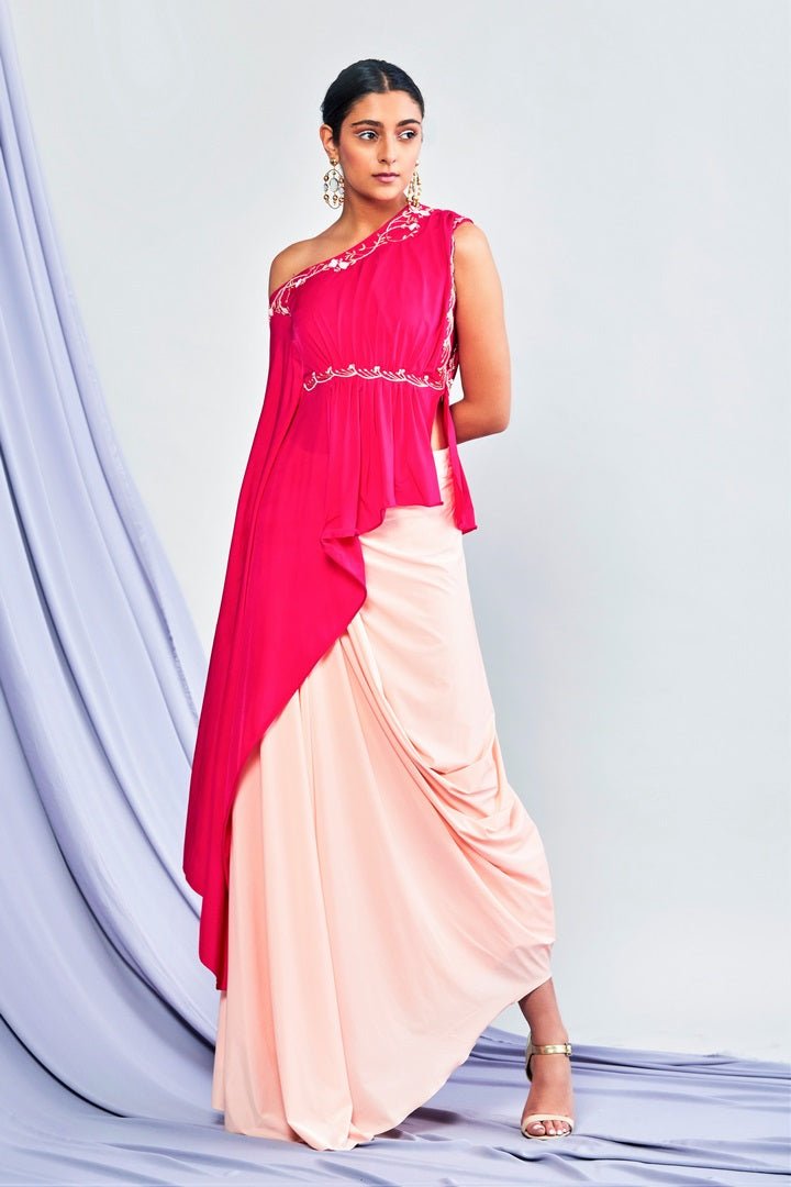 Buy pink one-shoulder embroidered top with drape skirt online in USA. Shop exclusive Indian designer saris, party dresses, wedding dresses in USA at Pure Elegance clothing store. Explore a range of traditional Indian women clothing also available at our online store. Shop now.-full view