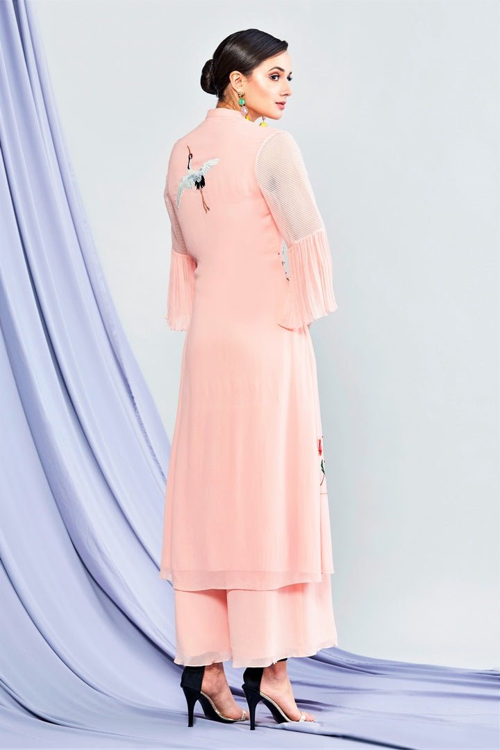 Buy blush pink embroidered kurta with palazzo online in USA. Shop exclusive Indian designer saris, party dresses, wedding dresses in USA at Pure Elegance clothing store. Explore a range of traditional Indian women clothing also available at our online store. Shop now.-back