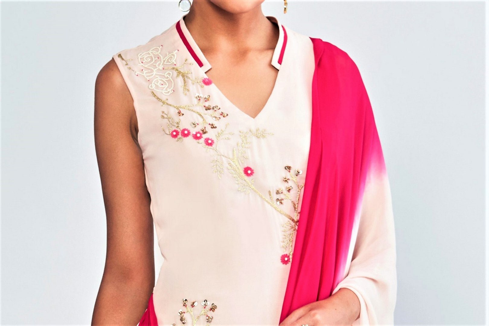Shop ombre pink embroidered georgette midi dress with attached drape online in USA. Shop exclusive Indian designer sarees, party dresses, wedding dresses in USA at Pure Elegance clothing store. Explore a range of traditional Indian women clothing also available at our online store. Shop now.-top