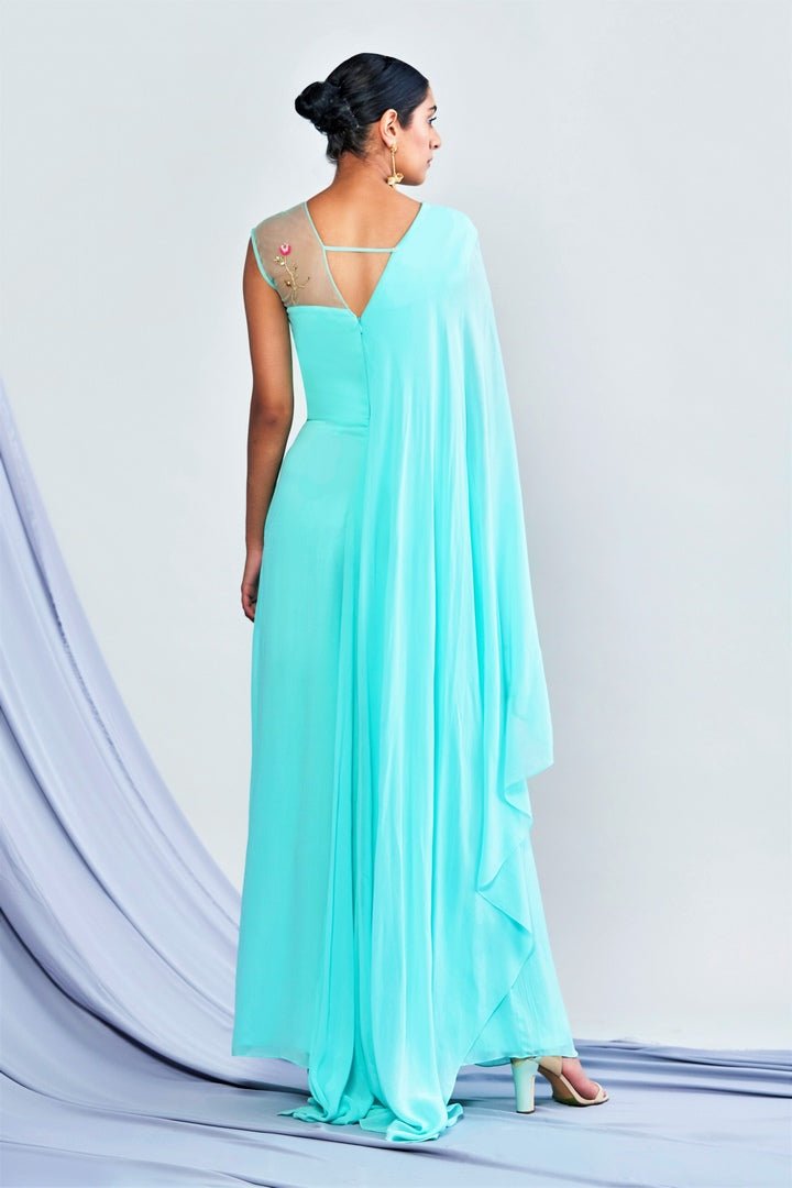 Buy turquoise blue embroidered georgette jumpsuit online in USA with attached drape. Elevate your Indian style with a range of exclusive Indian designer dresses from Pure Elegance clothing store in USA. We have an exquisite collection of Indian sarees, suits, Anarkalis, lehengas for Indian women living in USA. Shop now.-back