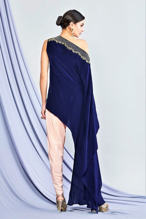 Shop navy blue asymmetric top with blush pink pants online in USA. Elevate your Indian style with a range of exclusive Indian designer dresses from Pure Elegance clothing store in USA. We have an exquisite collection of Indian sarees, suits, Anarkalis, lehengas for Indian women living in USA. Shop now.-back