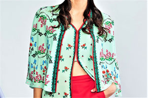 Shop sea green printed long top with printed cape jacket online in USA and red shorts. Elevate your Indian style with a range of exclusive Indian designer dresses from Pure Elegance clothing store in USA. We have an exquisite collection of Indian saris, suits, Anarkalis, lehengas for Indian women living in USA. Shop now.-top