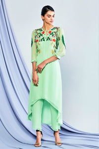 Shop sea green embroidered high low kurta with pants online in USA. Elevate your Indian style with a range of exclusive Indian designer dresses from Pure Elegance clothing store in USA. We have an exquisite collection of Indian saris, suits, Anarkalis, lehengas for Indian women living in USA. Shop now.-full view