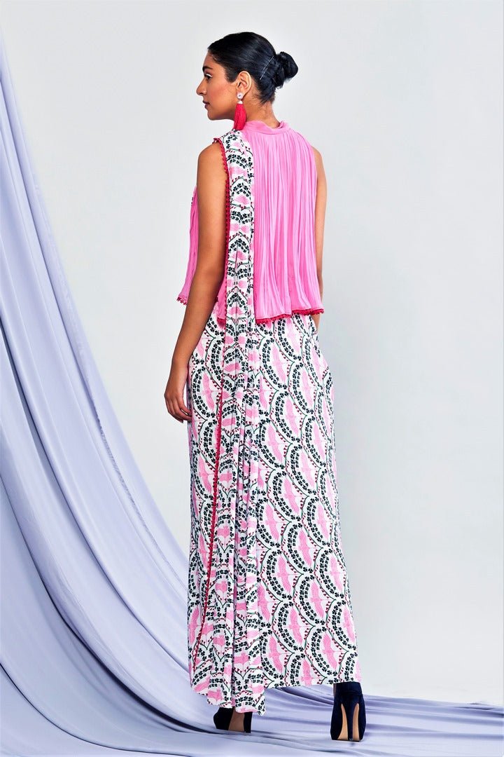 Shop pink sleeveless top with printed drape skirt online in USA. Elevate your Indian style with a range of exclusive Indian designer outfits from Pure Elegance clothing store in USA. We have an exquisite collection of Indian saris, suits, Anarkalis, lehengas for Indian women living in USA. Shop now. -back