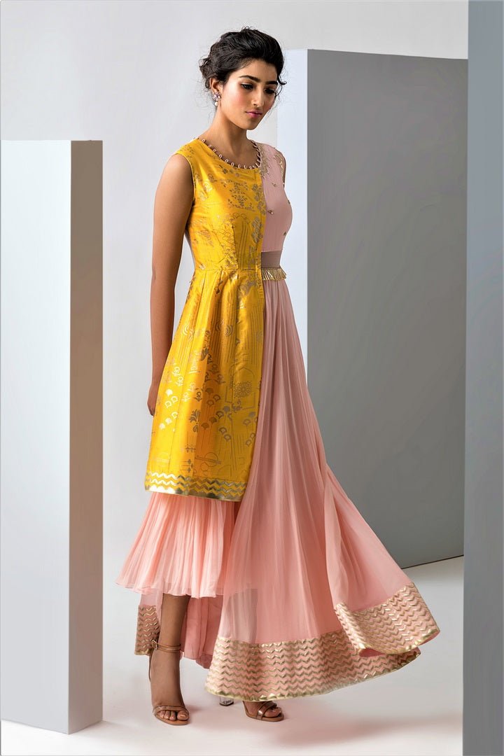 Buy pink and yellow embroidered floorlength Anarkali dress online in USA with attached drape. Make a dazzling style statement at parties, weddings and festive occasions with a range of exquisite designer dresses, designer gowns, wedding lehengas available at Pure Elegance Indian clothing store in USA or on our online store.-side