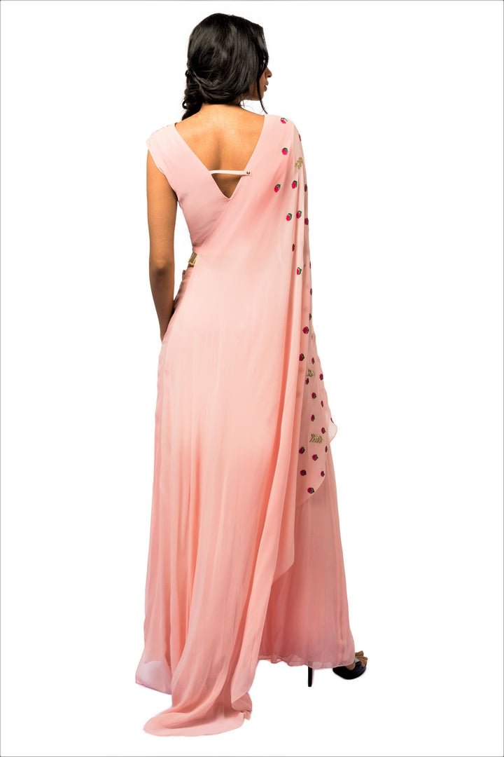 Shop pink embroidered crop top with drape online in USA and palazzo. Make a dazzling style statement at parties, weddings and festive occasions with a range of exquisite designer dresses, designer gowns, wedding lehengas available at Pure Elegance Indian clothing store in USA or on our online store.-back