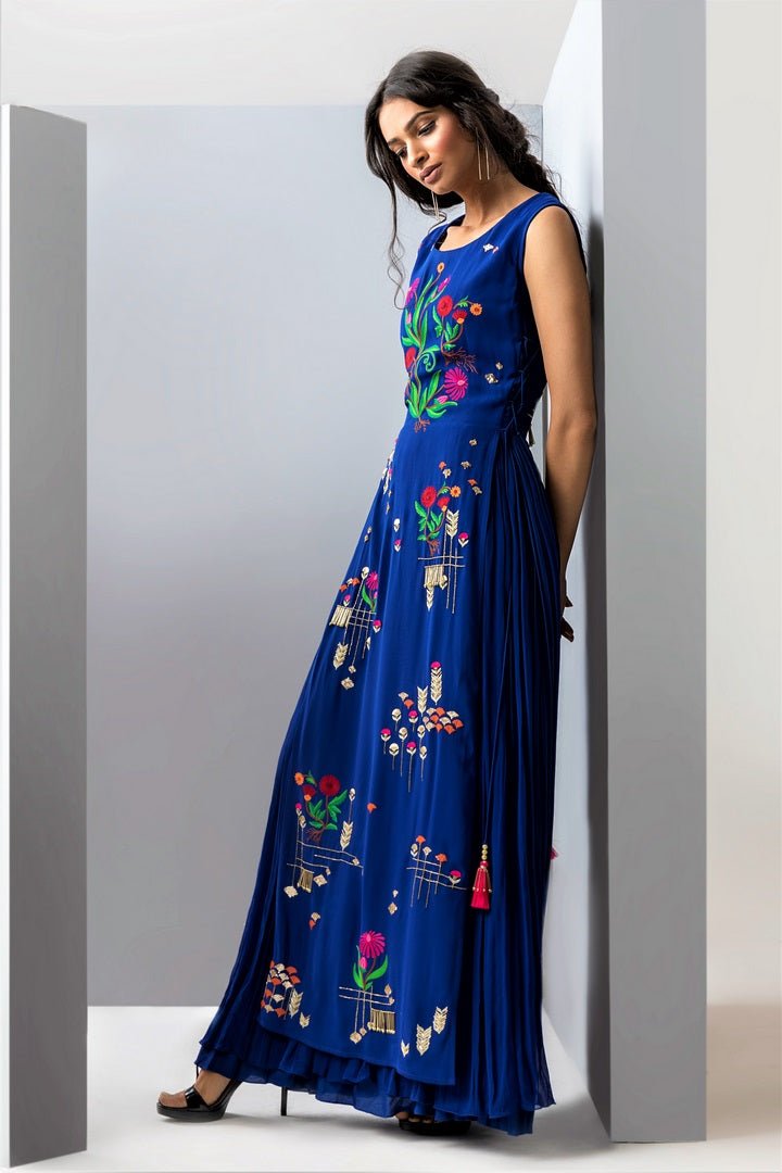 Shop blue embroidered layered gown online in USA. Make a dazzling style statement at parties, weddings and festive occasions with a range of exquisite designer dresses, designer gowns, wedding lehengas available at Pure Elegance Indian clothing store in USA or on our online store.-side