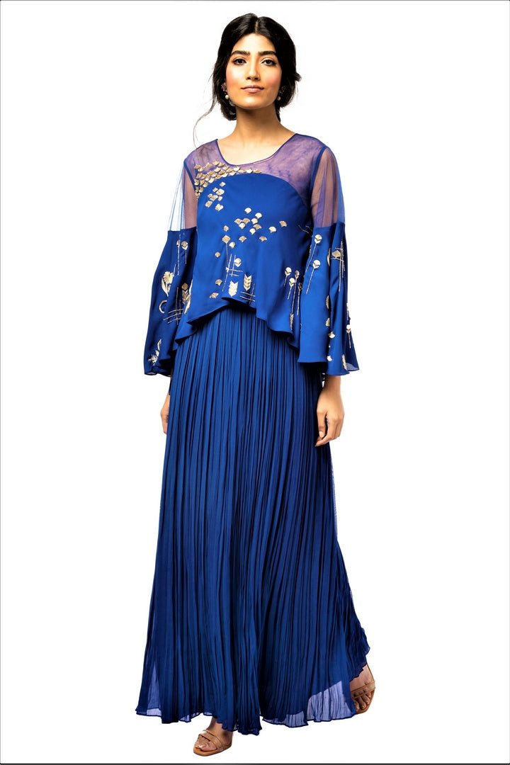 Shop beautiful blue embroidered and layered long dress online in USA. Make a dazzling style statement at parties, weddings and festive occasions with a range of exquisite designer dresses, designer gowns, wedding lehengas available at Pure Elegance Indian clothing store in USA or on our online store.-full view