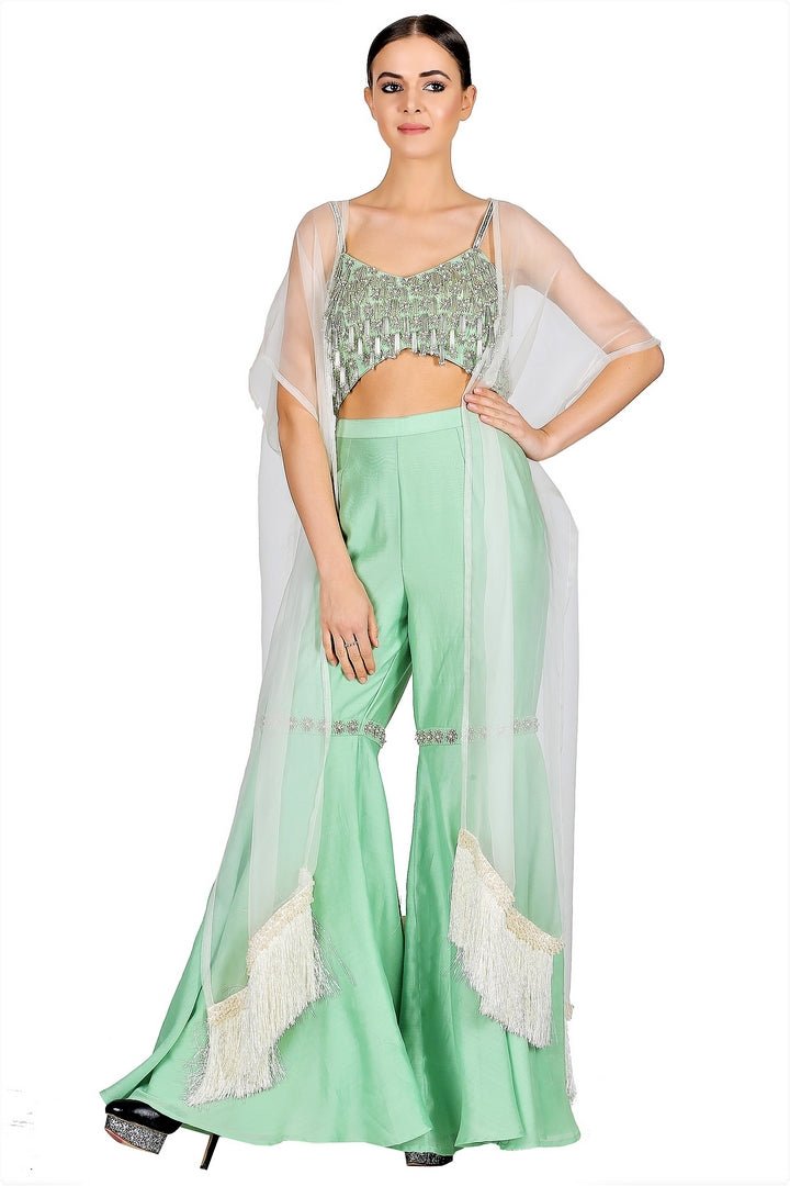 Buy mint green embroidered blouse with sharara pants online in USA and cape. Give your wardrobe an exquisite variety of designer dresses, designer gowns, wedding lehengas, Anarkali suits from Pure Elegance Indian clothing store in USA or from our online store.-full view