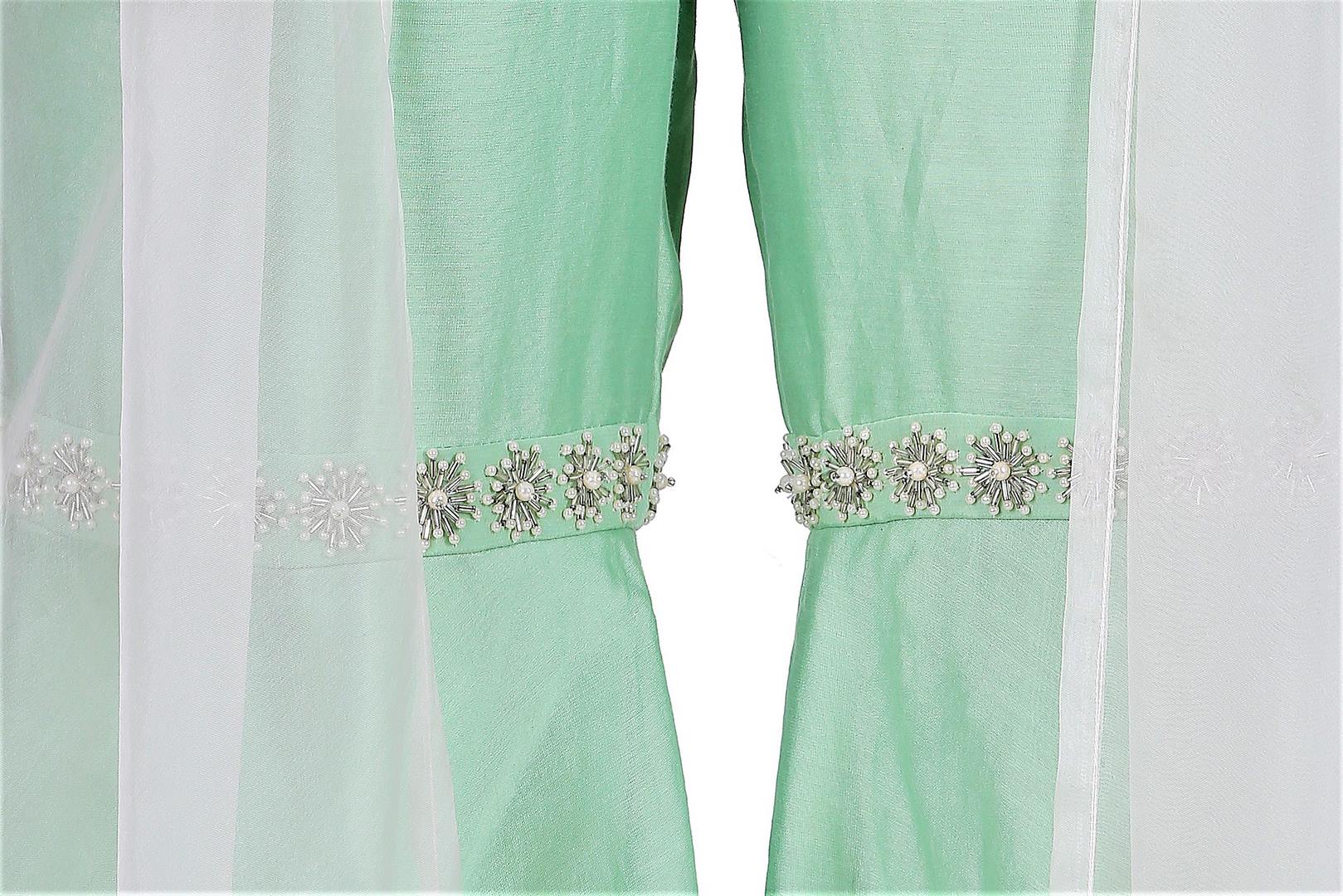 Buy mint green embroidered blouse with sharara pants online in USA and cape. Give your wardrobe an exquisite variety of designer dresses, designer gowns, wedding lehengas, Anarkali suits from Pure Elegance Indian clothing store in USA or from our online store.-sharara