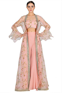 Buy light peach blouse with sharara online in USA and floral print cape. Give your wardrobe an exquisite variety of designer dresses, designer gowns, wedding lehengas, Anarkali suits from Pure Elegance Indian clothing store in USA or from our online store.-full view