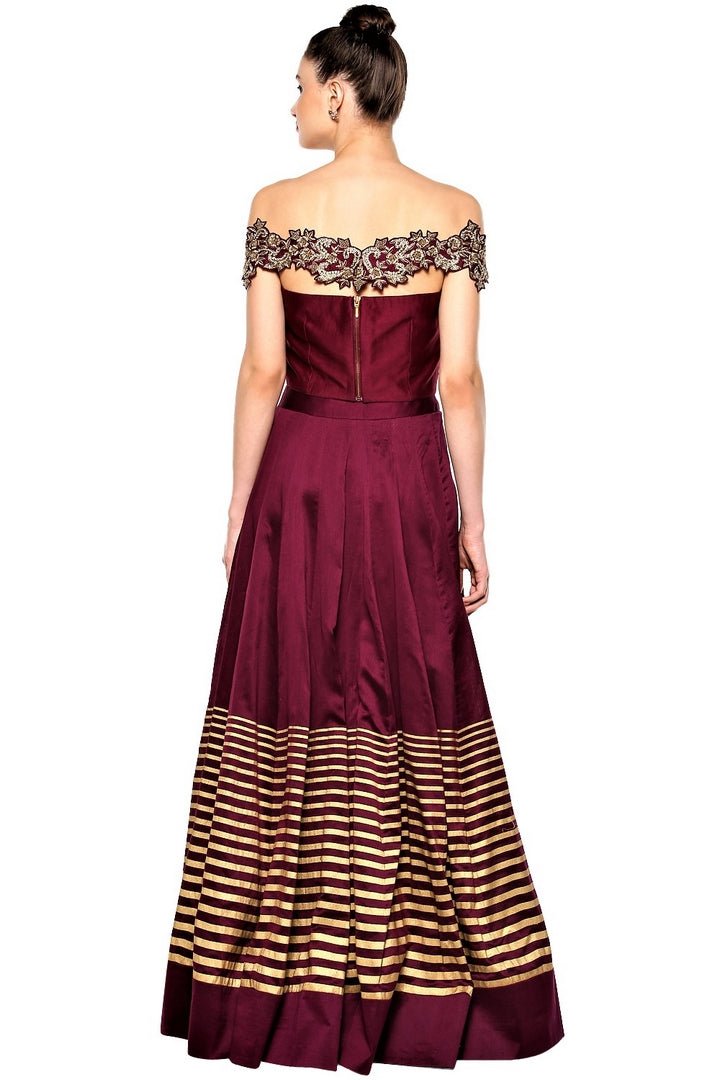 Buy wine color embroidered off-shoulder top with skirt online in USA. Give your wardrobe an exquisite variety of designer dresses, designer gowns, wedding lehengas, Anarkali suits from Pure Elegance Indian clothing store in USA or from our online store.-back