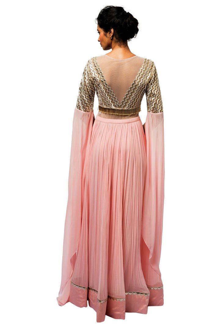 Shop elegant blush pink embroidered georgette gown online in USA. Revamp your wardrobe with an exquisite variety of designer dresses, designer gowns, wedding lehengas, Anarkali suits, Indian sarees from Pure Elegance Indian clothing store in USA or from our online store. -back