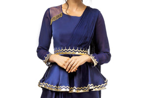 Buy blue embroidered satin peplum blouse with attached drape and dhoti skirt online in USA. Revamp your wardrobe with an exquisite variety of designer dresses, designer gowns, wedding lehengas, Anarkali suits, Indian designer saris from Pure Elegance Indian clothing store in USA or from our online store. -blouse