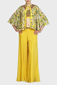 Buy Indowestern yellow printed & embroidered blouse with cape and sharara online in USA. For more such gorgeous designer dresses, shop at Pure Elegance Indian fashion store in USA. A beautiful range of traditional sarees and designer clothing is available for Indian women living in USA. You can also shop at our online store.-full view