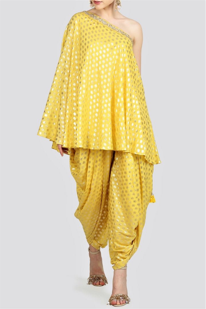 Shop yellow one-shoulder embroidered top with dhoti pants online in USA. For more such gorgeous designer dresses, shop at Pure Elegance Indian fashion store in USA. A beautiful range of traditional Indian sarees and designer clothing is available for Indian women living in USA. You can also shop at our online store.-full view