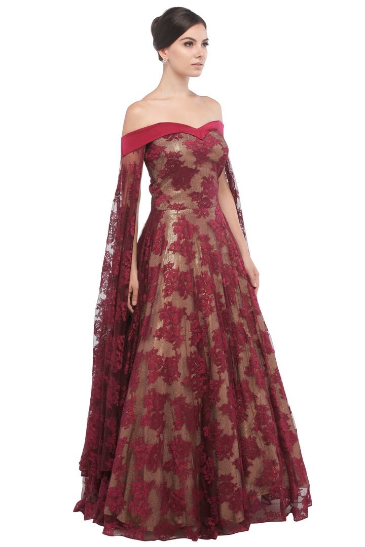 Buy glamorous wine color off shoulder lace gown online in USA at Pure Elegance online store. Get a gorgeous ethnic look with a range of exquisite Indian designer dresses from our clothing store in USA. We also got the best Indian dresses for the brides in USA. Shop now.-right