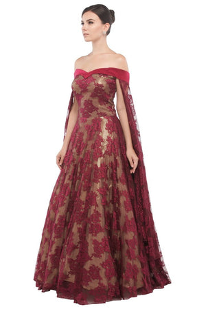 Buy glamorous wine color off shoulder lace gown online in USA at Pure Elegance online store. Get a gorgeous ethnic look with a range of exquisite Indian designer dresses from our clothing store in USA. We also got the best Indian dresses for the brides in USA. Shop now.-left