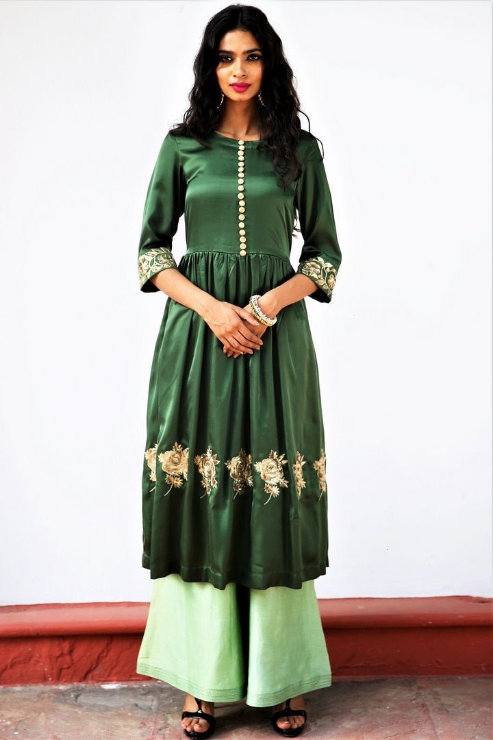 Buy seaweed green embroidered silk tunic with palazzo online in USA. Get occasion ready with a stunning range of Indian designer dresses from Pure Elegance fashion store in USA. Shop from a collection of designer suits, wedding sarees, wedding lehengas and Indian clothing for a gorgeous ethnic look from our online store.-full view