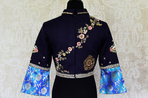 Shop navy blue embroidered designer silk blouse with collars online in USA. For Indian women in USA, Pure Elegance fashion store brings an alluring collection of readymade sari blouses to match your beautiful Indian saris. Shop now at our online store.-back