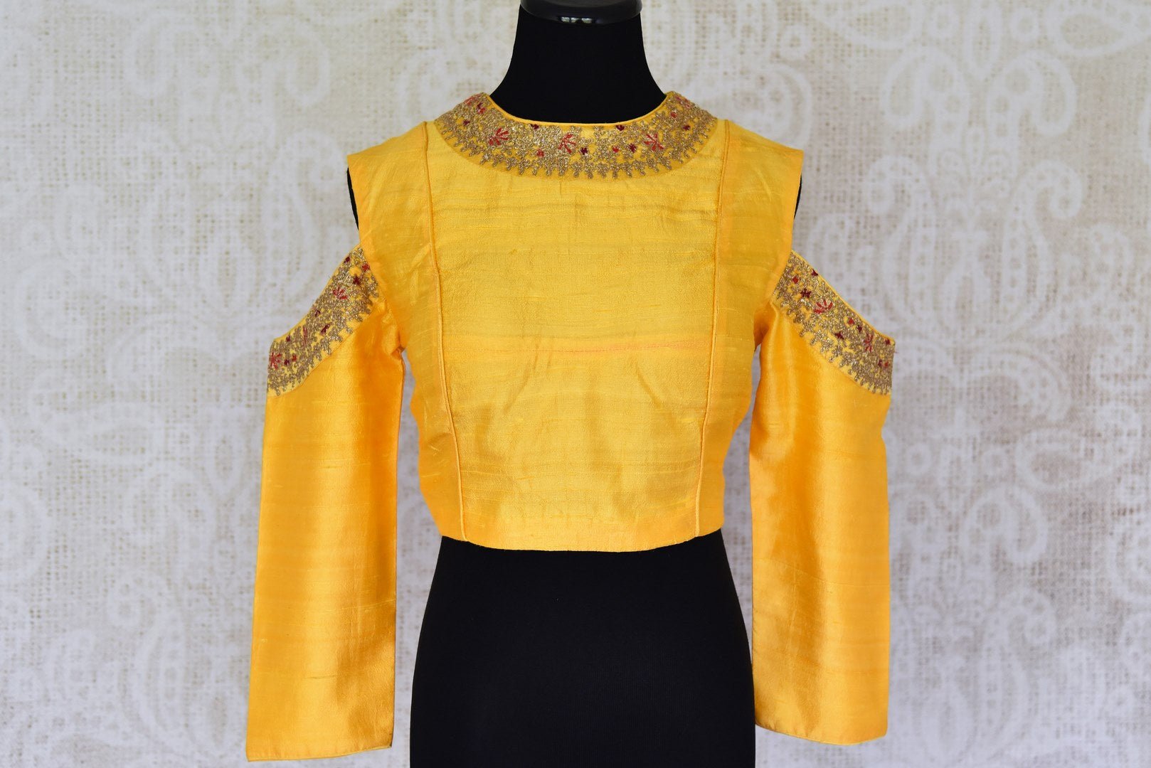 Shop yellow color embroidered cold shoulder silk sari blouse online in USA. For Indian women in USA, Pure Elegance fashion store brings an alluring collection of readymade saree blouses to match your beautiful Indian sarees. Shop now at our online store.-front